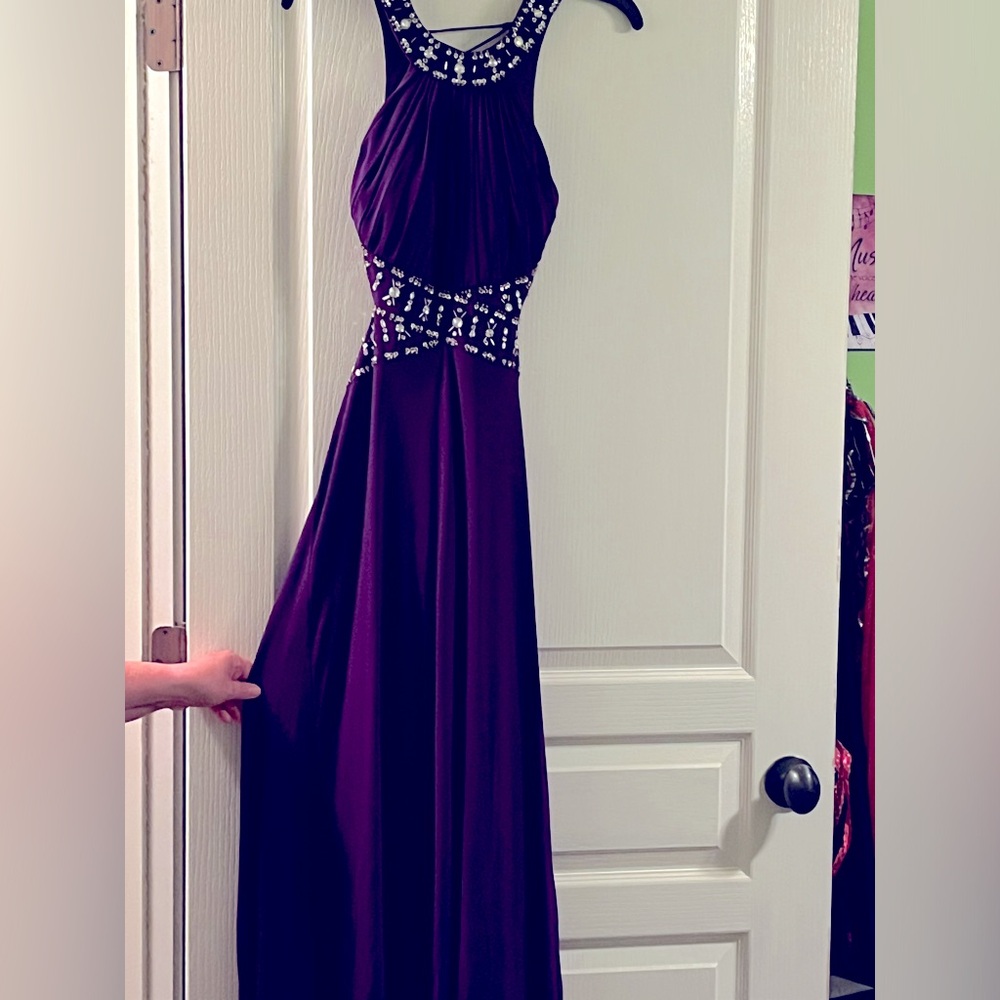 A size 7/8 Morgan & Co backless purple prom dress